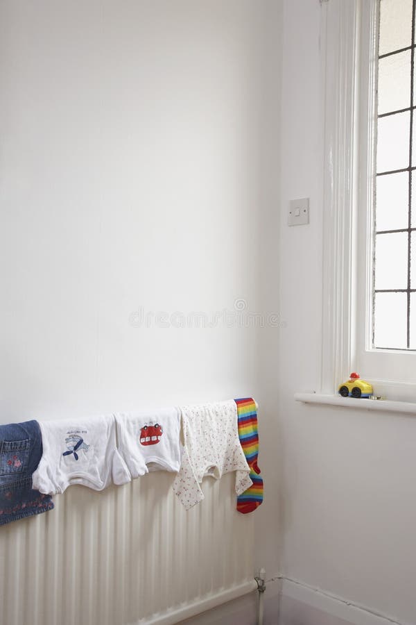 Child S Clothing Drying on Radiator Stock Image Image of hanging