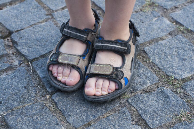 Buy > feet on sandals > in stock