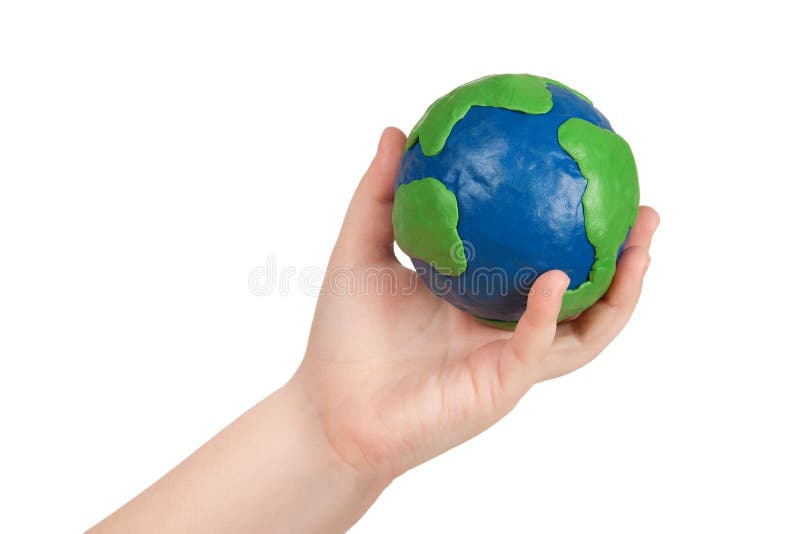 Child s hand holding a globe