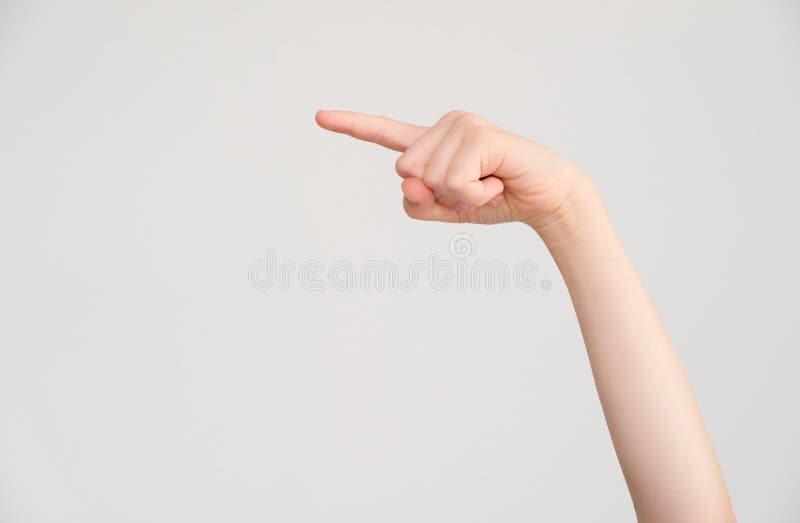 The child`s index finger points to the side royalty free stock photography