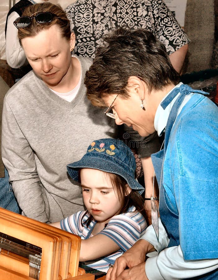 Child s weaving lesson at fair