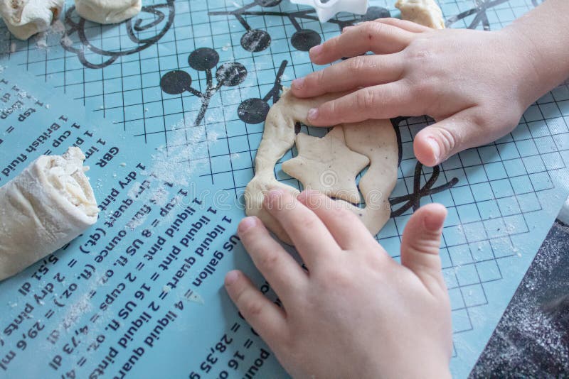 Child Sculpts Cookies from the Dough, Hands Closeup Stock Photo Image