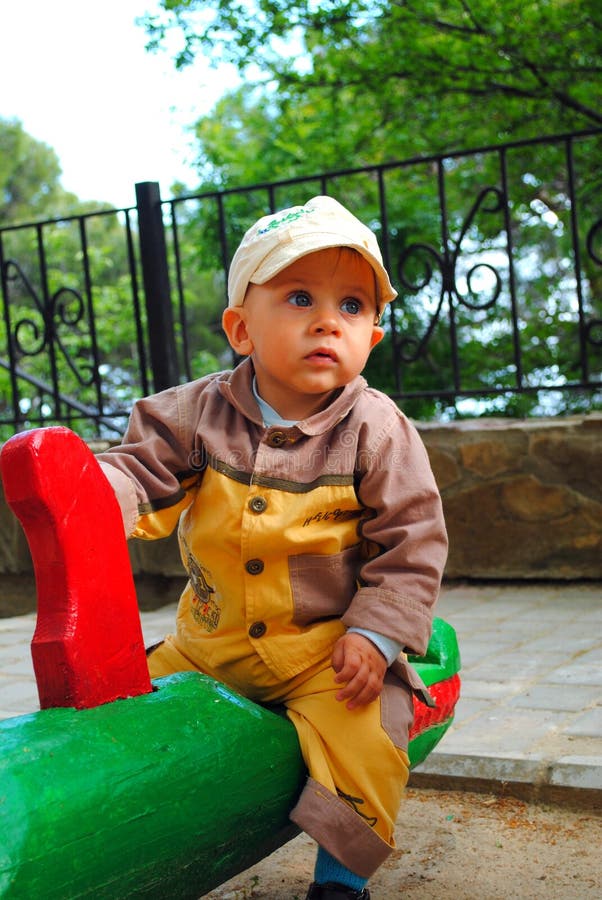 Child on seesaw