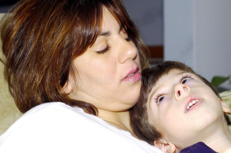 Child Sitting On Moms Lap