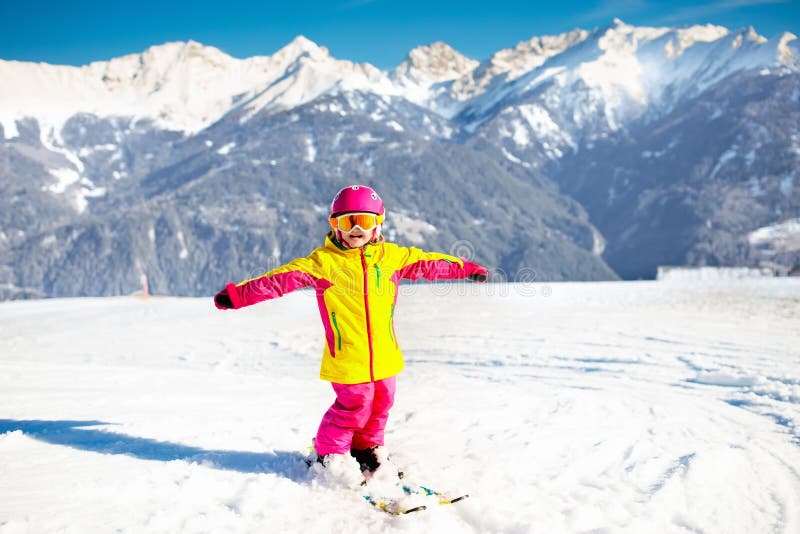 Kids winter snow sport. Children ski. Family skiing.