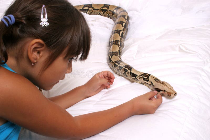 Child and Snake stock image Image of child touch Child and Snake stock image Image of child touch