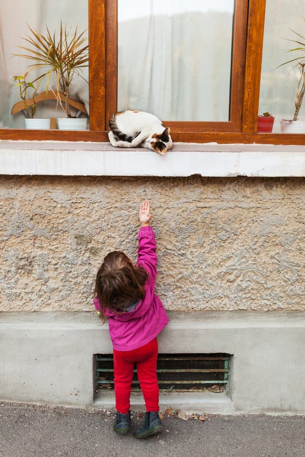 Child and spoiled cat