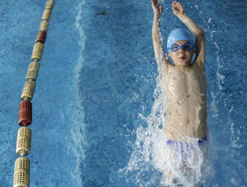 Child swimmer in swimming pool