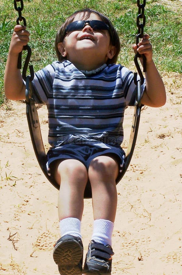 Child Swinging stock image. Image of caucasian, summer 123001