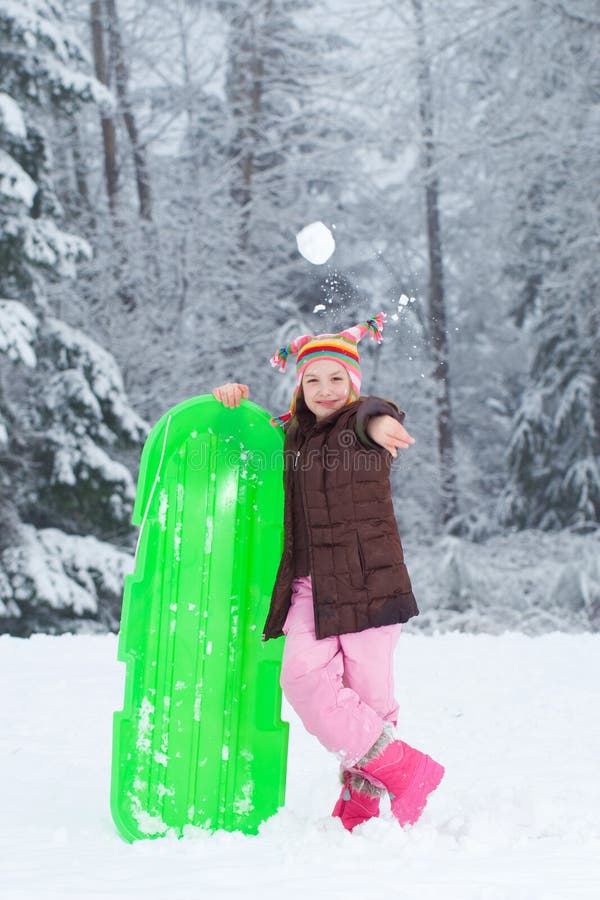 Child throwing a snowball stock photo. Image of healthy 22871348