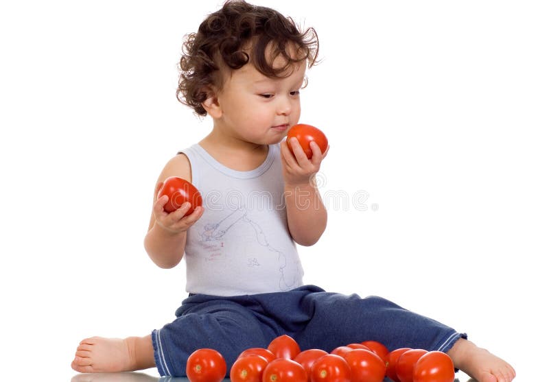 Child with tomato.