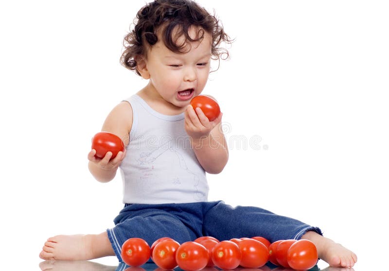 Child with tomato.