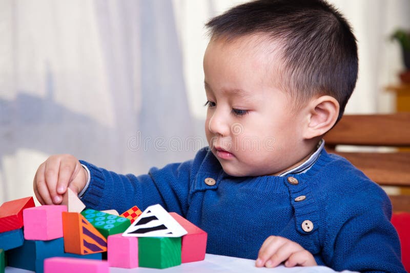 Child and toy blocks