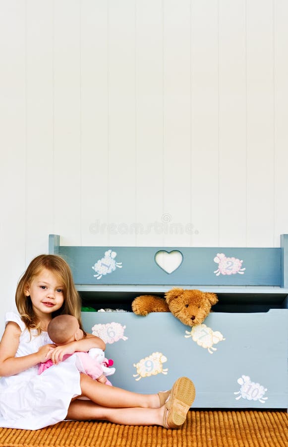Child with toy chest stock photography Child with toy chest stock photography