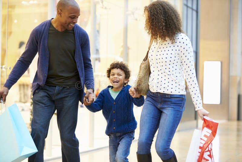 Child on Trip To Shopping Mall with Parents Stock Photo - Image of ...