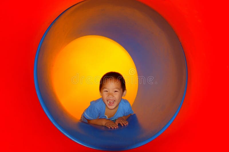 Child in tube slide