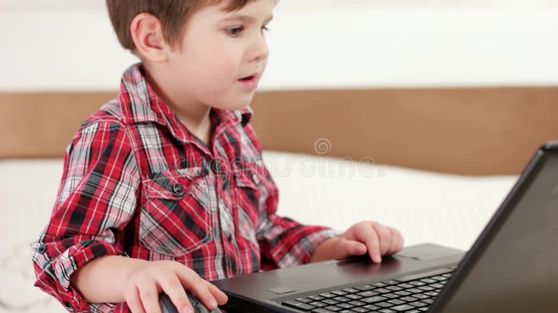 kid playing computer