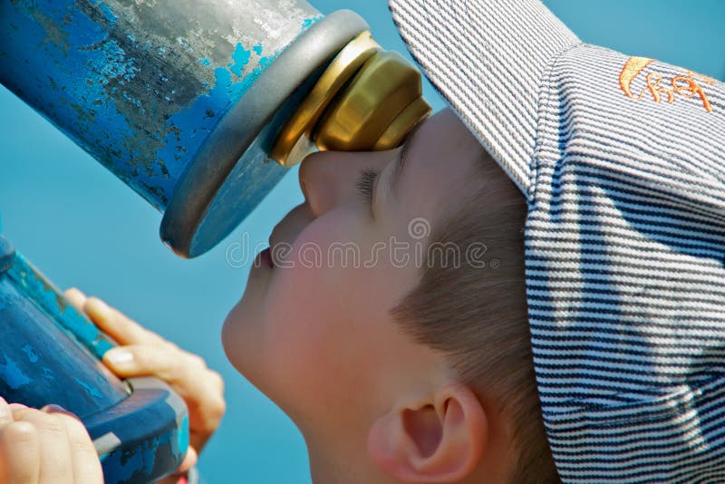 Child using telescope stock images Child using telescope stock images