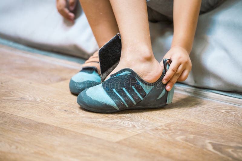 The Child is Wearing Climbing Shoes. Stock Image - Image of extreme ...