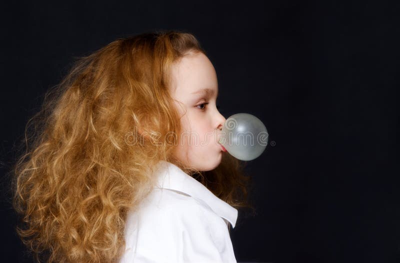 Young Child Blowing a Bubble with Gum Stock Image Image of background