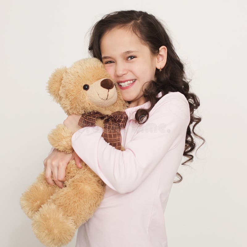 Cute Little Girl Hugging Teddy Bear Stock Photo - Image of comfort ...