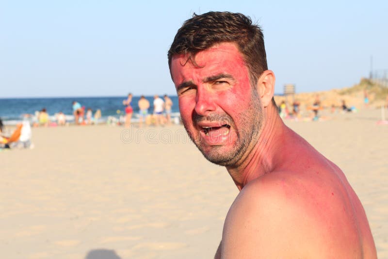 Childish looking adult crying at the beach stock photography Childish looking adult crying at the beach stock photography