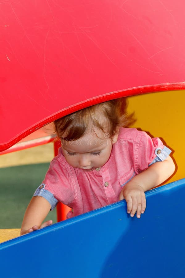 Children autism peculiar playing outside playground, kid in park, childhood. Children autism peculiar playing outside playground, kid in park, childhood games stock photo Children autism peculiar playing outside playground, kid in park, childhood. Children autism peculiar playing outside playground, kid in park, childhood games stock photo