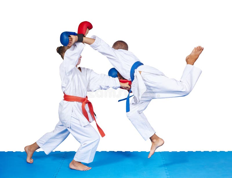 Children are Beating Karate Punches on the Mat Isolated Stock Photo