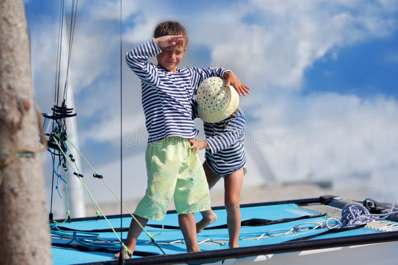 Children on board of sea yacht