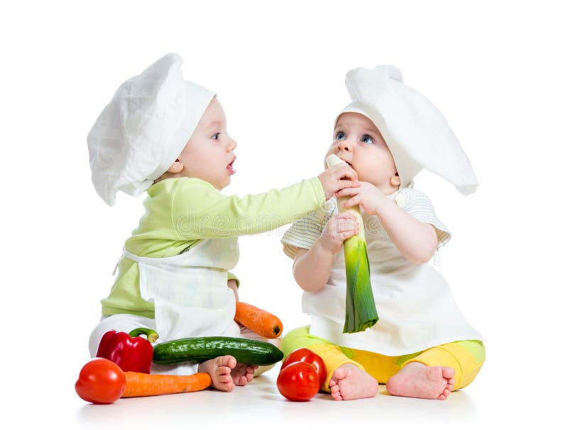 Chico agotador cocinero un sombrero saludable comida verduras.