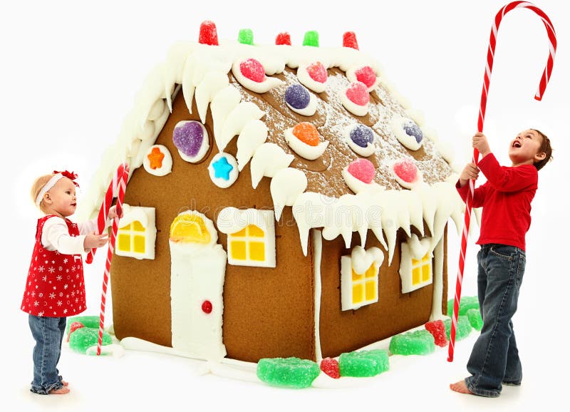 Children Building Giant Christmas Gingerbread Hous royalty free stock photo Children Building Giant Christmas Gingerbread Hous royalty free stock photo