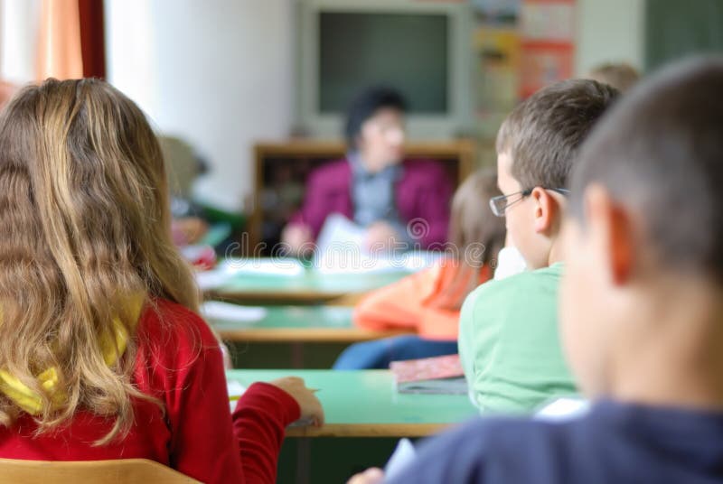 Children in classroom royalty free stock photo