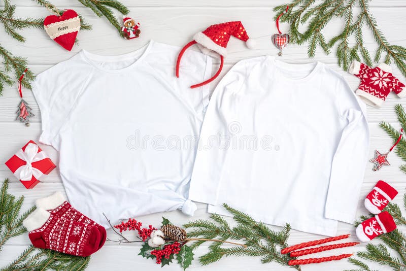 Children Clothes with Christmas Symbols and DÃ©cor on Table Stock Image ...