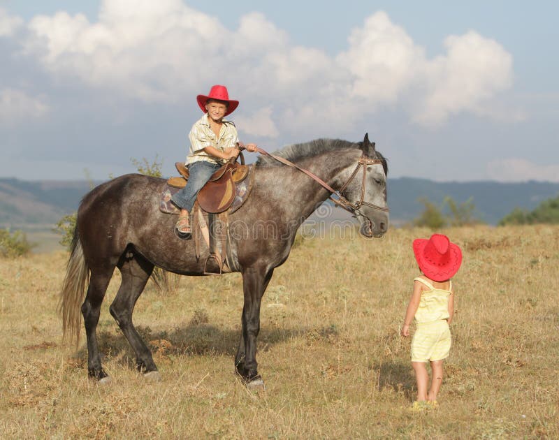 Children in Cowboy Hat Riding Horse Outdoors Stock Image Image of