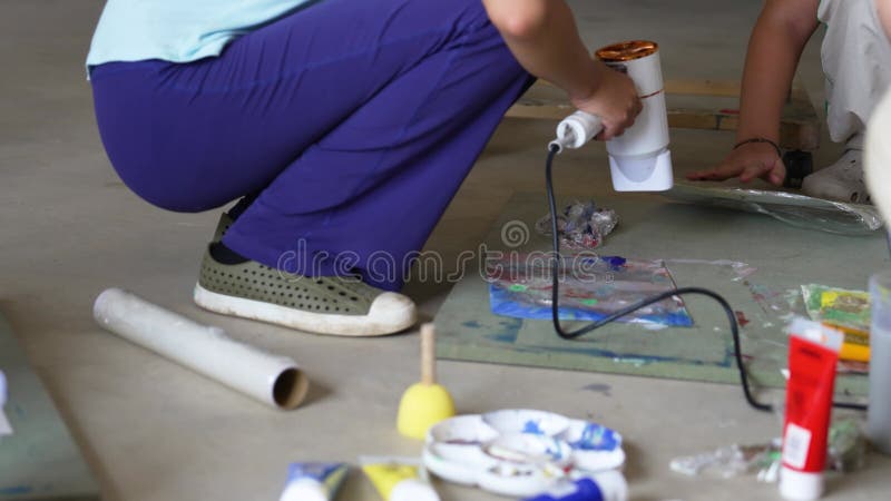 Children creating colorful watercolor paintings vector illustration