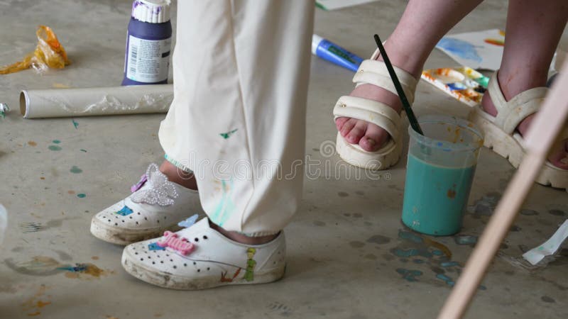 Children creating colorful watercolor paintings stock illustration