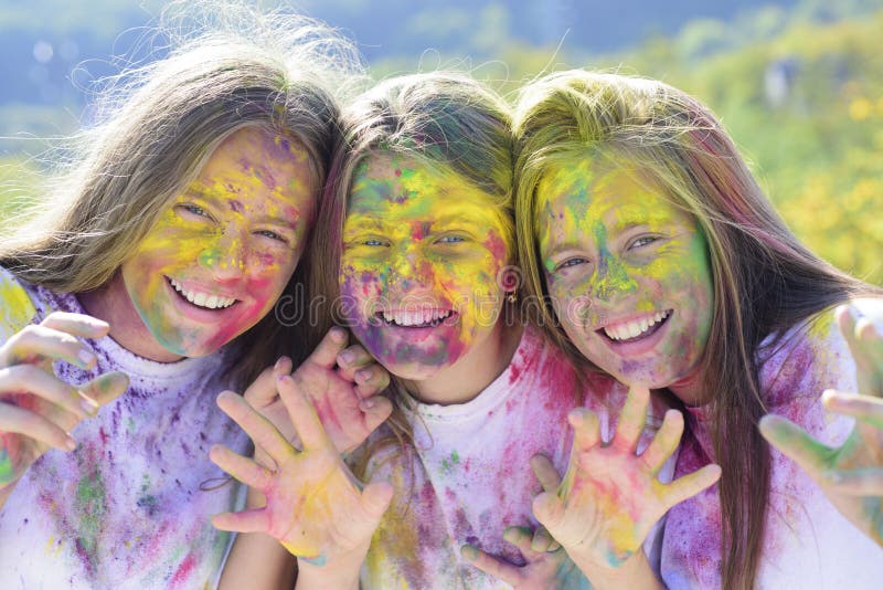 Children with creative body art. Crazy hipster girls. Summer weather. positive and cheerful. colorful neon paint makeup stock images Children with creative body art. Crazy hipster girls. Summer weather. positive and cheerful. colorful neon paint makeup stock images