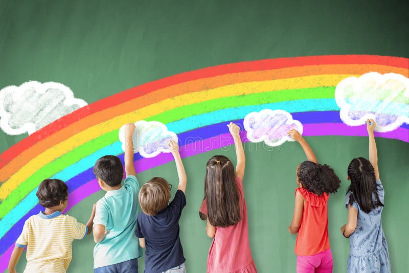Children drawing rainbow and cloud on the chalkboard stock photos