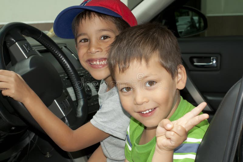 Children driving a car stock image. Image of close, children 21077297