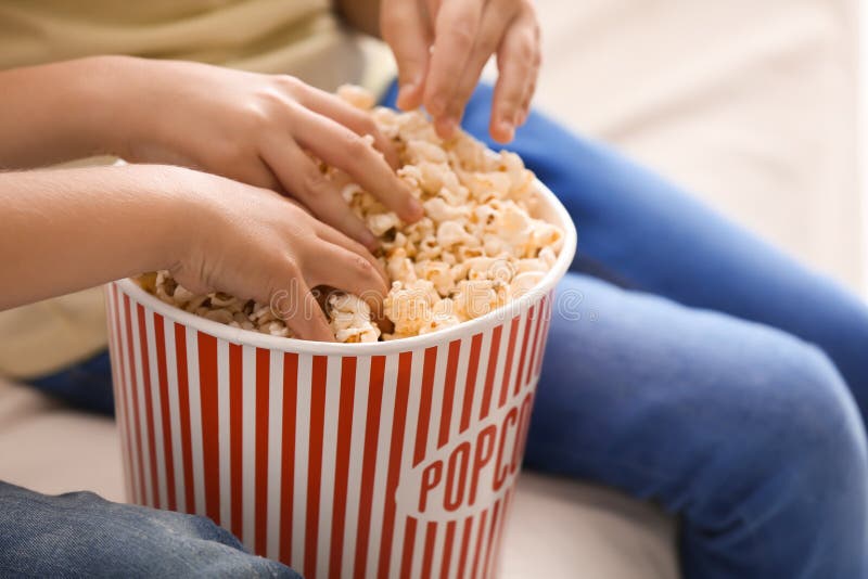 Children Eating Popcorn at Home, Closeup Stock Image Image of corn