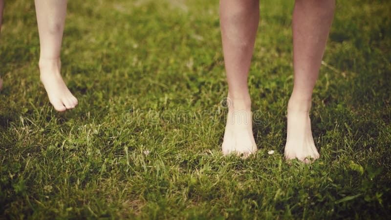 Children Feet on Green Grass Stock Footage - Video of happy, childhood ...