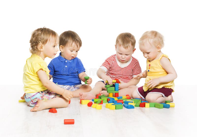 Children Group Playing Toy Blocks. Little Kids Early Development