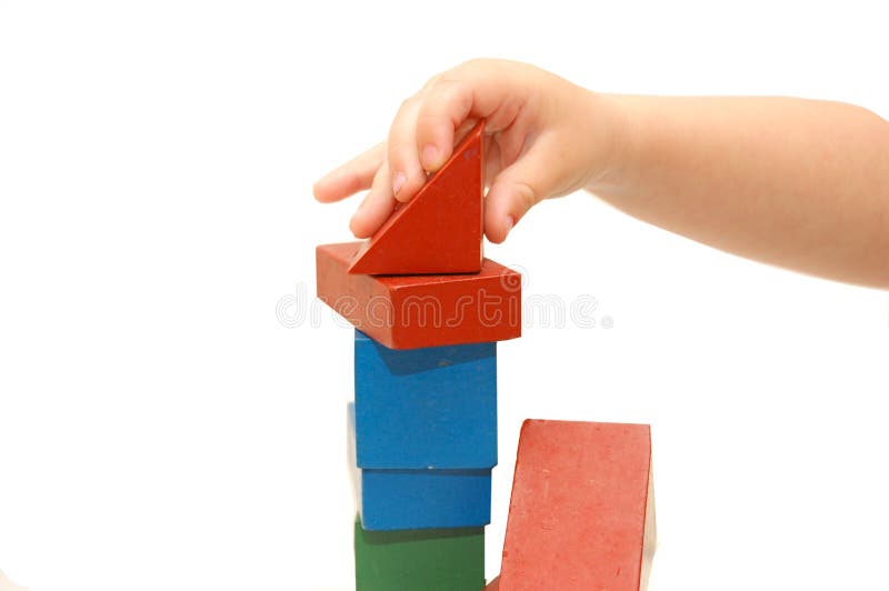 The children hand builds construction from cubes stock images