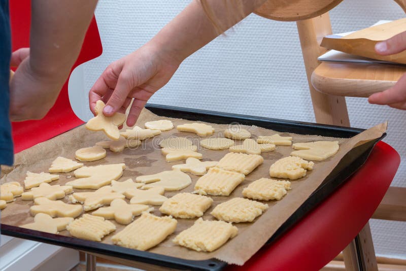 Children Hand Laying Cookie on a Baking Tray Stock Image Image of