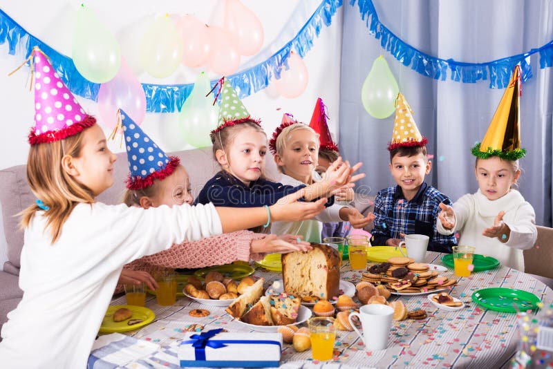 Children Having Birthday Dinner Stock Photo - Image of celebrating