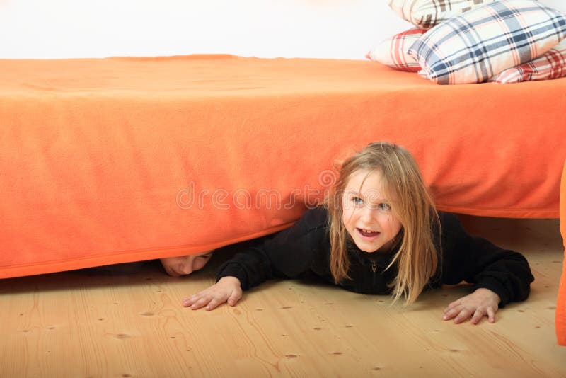 Children hiding under bed stock photo. Image of hide ...