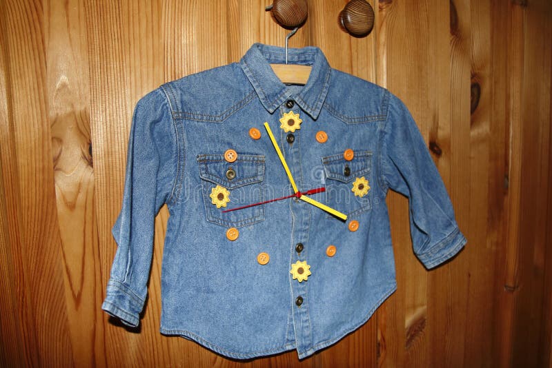 Children Jeans Shirt in Handicrafts into a Clock Converts Stock Photo