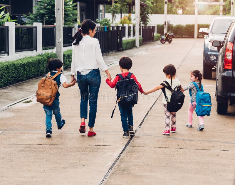 Children kid son girl and boy kindergarten walking going to school stock image Children kid son girl and boy kindergarten walking going to school stock image