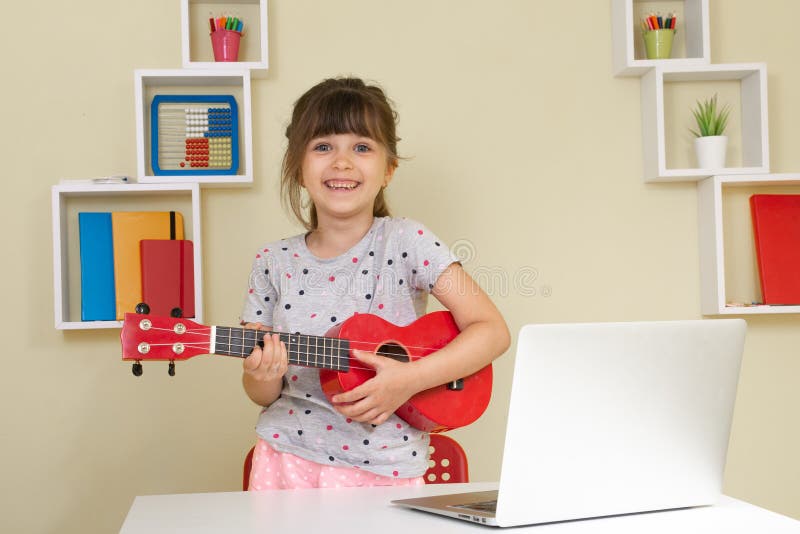 Children learn music lessons online at home. Homeschooling and distance education for kids.