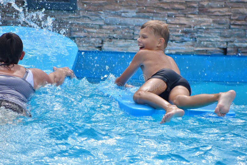 Thailand. Hua hin. February 2020. Children in water Park. Fun in the tropics. Happy kids in the pool. Thailand. Hua hin. February 2020. Children in water Park. Fun in the tropics. Happy kids in the pool.